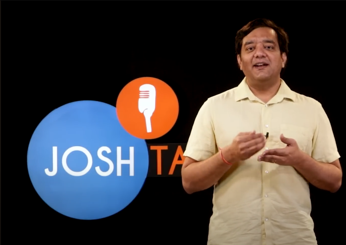 Person speaking at Josh Talk event. , competishun jee and neet coaching , mohit tyagi
